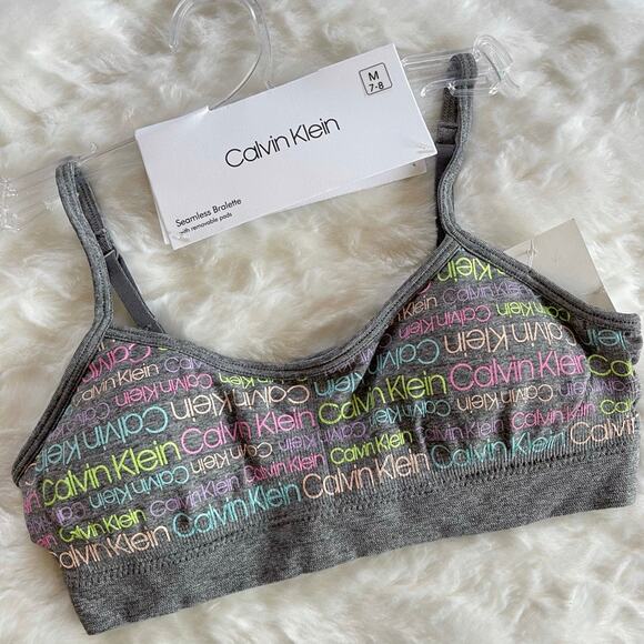 Calvin Klein Girls Adjustable Strap Seamless Removable Pad Grey Logo Bralette M - Picture 1 of 4